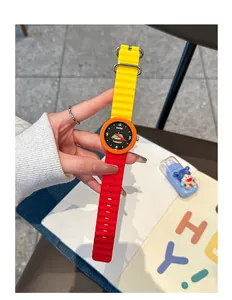 Detail view of GCCLIYO colorful silicone wristwatch with playful burger illustration dial