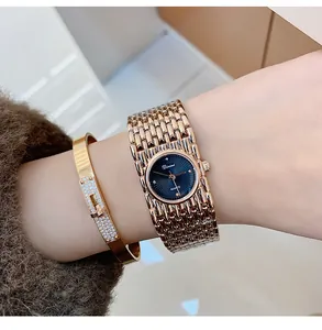 Elegant rose gold ladies quartz watch with unique linked strap and crystal bracelet detail