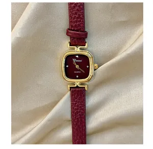 Elegant vintage women's quartz watch with Angola red dial and matching textured leather strap