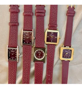 Collection of vintage Angola red women's quartz watches with elegant gold-tone cases