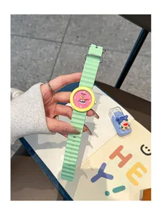 Close-up detail of a pastel silicone watch featuring a cute cartoon illustration