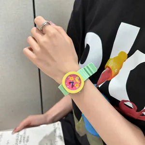 Colorful dopamine style cartoon kids wristwatch with green silicone strap and stars