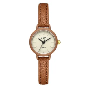 Minimalist retro GEDI women's quartz watch with brown leather strap and cream dial