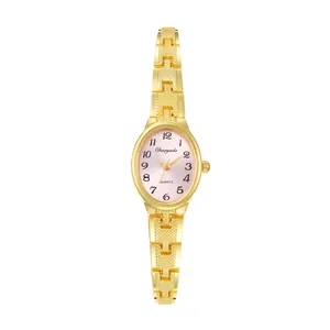 Elegante orologio da polso ovale dorato da donna con quadrante rosa e cinturino lucido