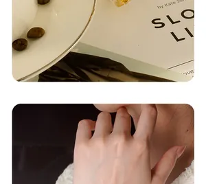 Lifestyle detail shot for fashion square women's bracelet watch with cozy white knit sleeve