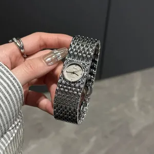 Dinimi vintage silver bracelet watch for women with quartz movement and elegant design