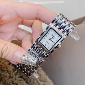 Elegante Dinimi zilveren horloge met vierkante wijzerplaat en vintage stijl armband