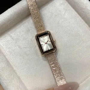 Elegant rose gold rectangular quartz watch with textured mesh strap for women and girls