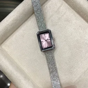 Detailed view of GEDI elegant rectangular watch with pink dial and silver mesh band