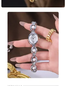Elegant GEDI women's silver bracelet watch with pearl details and oval dial