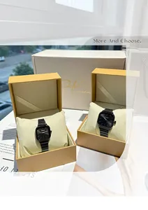 Elegant pair of black minimalist quartz couple watches presented in premium gift boxes