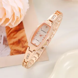 Elegant rose gold tonneau-shaped women's bracelet watch with crystal accents