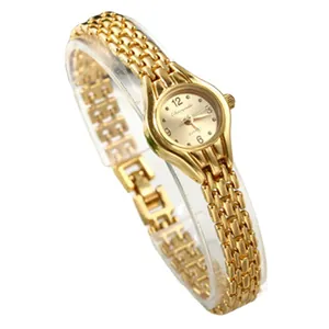 Elegante gouden damesarmbandhorloge met ronde wijzerplaat en trendy quartz uurwerk design