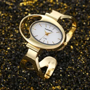 Vista dettagliata dell'orologio da polso ovale CANSNOW in oro per donna con quadrante bianco