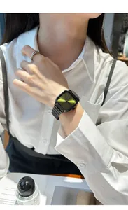 Detail view of elegant square watch with green sunray dial and black metal strap