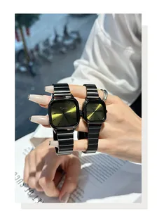 Couple's watch set with square green sunburst dials and black metal straps