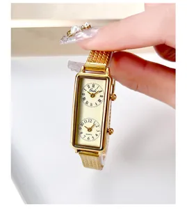 Detailed view of Gedi vintage gold rectangular watch featuring dual time zone dials.