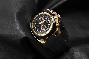 Close-up of V6 men's fashion watch with gold case and black silicone strap