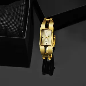 Elegante orologio al quarzo da donna in oro con quadrante rettangolare e scatola