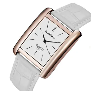 Dettaglio dell'orologio rettangolare WoMaGe da uomo con cassa oro rosa e cinturino bianco