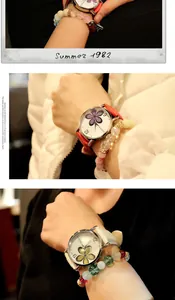 Vista dettagliata dell'elegante orologio al quarzo da donna con il quadrifoglio