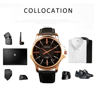 Reloj de cuarzo Yazole para hombre presentado con diversos accesorios de moda de lujo.
