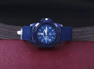 Close-up detail of a Gemius Army blue sports watch featuring a durable navy canvas strap