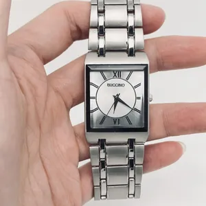 Detailed view of square business quartz watch with silver steel link bracelet
