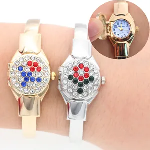 Detail view of Chanyada flip-up ladies bangle watch with rhinestones and floral design