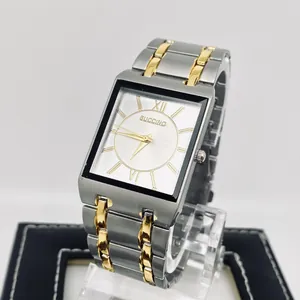 Side view detail of a classic square business quartz watch with two-tone steel band