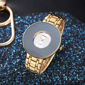 Vista dettagliata dell'orologio al quarzo vintage CANSNOW in oro con quadrante grande
