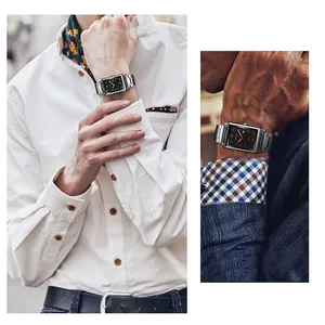 Primo piano di un classico orologio business da uomo con cinturino in acciaio inossidabile