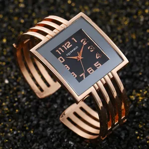 Elegante orologio al quarzo ogyawatch in oro rosa con quadrante quadrato e cinturino rigido