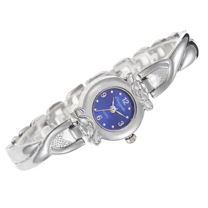 Montre à quartz élégante argentée pour femme avec cadran bleu et bracelet à motif floral