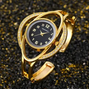 Elegante orologio a bracciale rigido ogyawatch dorato con quadrante nero e cristalli