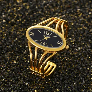 Élégante montre bracelet dorée dotée d'un cadran ovale noir classique pour femme