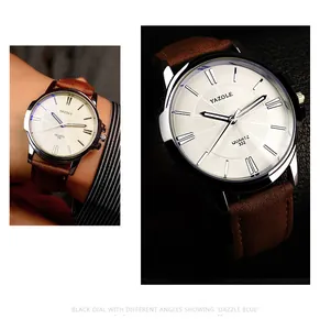 Dettaglio dell'orologio business Yazole con quadrante bianco e cinturino in pelle marrone