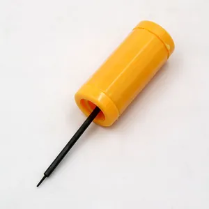Detailed macro view of yellow plastic watch link remover tool with a black metal needle tip
