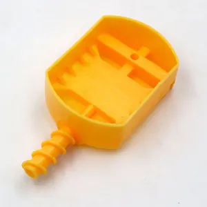 Detailed view of yellow plastic watch band link remover tool for strap adjustment