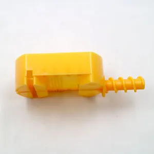 Detailed side view of a yellow plastic watch strap link remover tool for adjustment