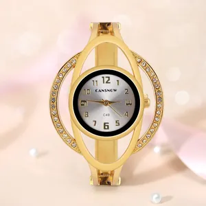 Elegante orologio a bracciale CANSNOW dorato con lunetta in strass e quadrante argento