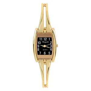 Elegant gold vintage bracelet quartz watch for women featuring a black rectangular dial