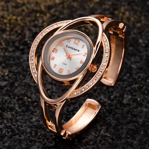 Elegante orologio a bracciale in oro rosa con strass e dettaglio del quadrante Cansnow