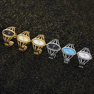 Montre Jonc à Quartz Mode pour Femmes Cadran Ovale en Alliage Design Creux à Plusieurs Lignes Bracelet Montre Bijoux Élégants