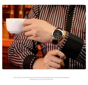 Detalle de un reloj de cuarzo Yazole para hombre en la muñeca en un entorno de negocios chic.