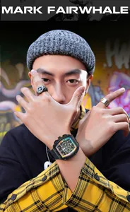 Close-up of Mark Fairwhale luminous waterproof quartz watch on male model's wrist