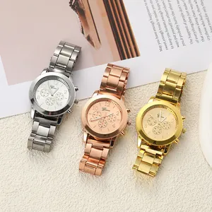 Macro view of three Geneva fashion women's quartz watches in gold and silver.