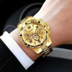 Detailed shot of a luxury gold business quartz watch with a stainless steel band on wrist