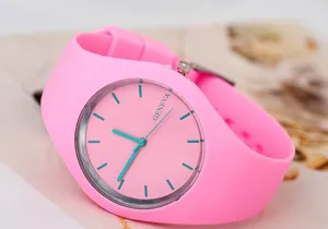 Detailed close-up of pink GENEVA ultra-thin silicone watch with teal accents