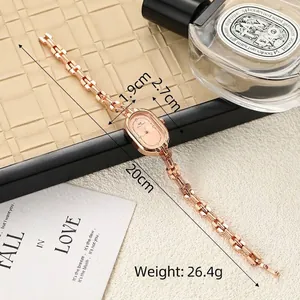 Rose gold oval women's bracelet watch with vintage link strap and measurement details